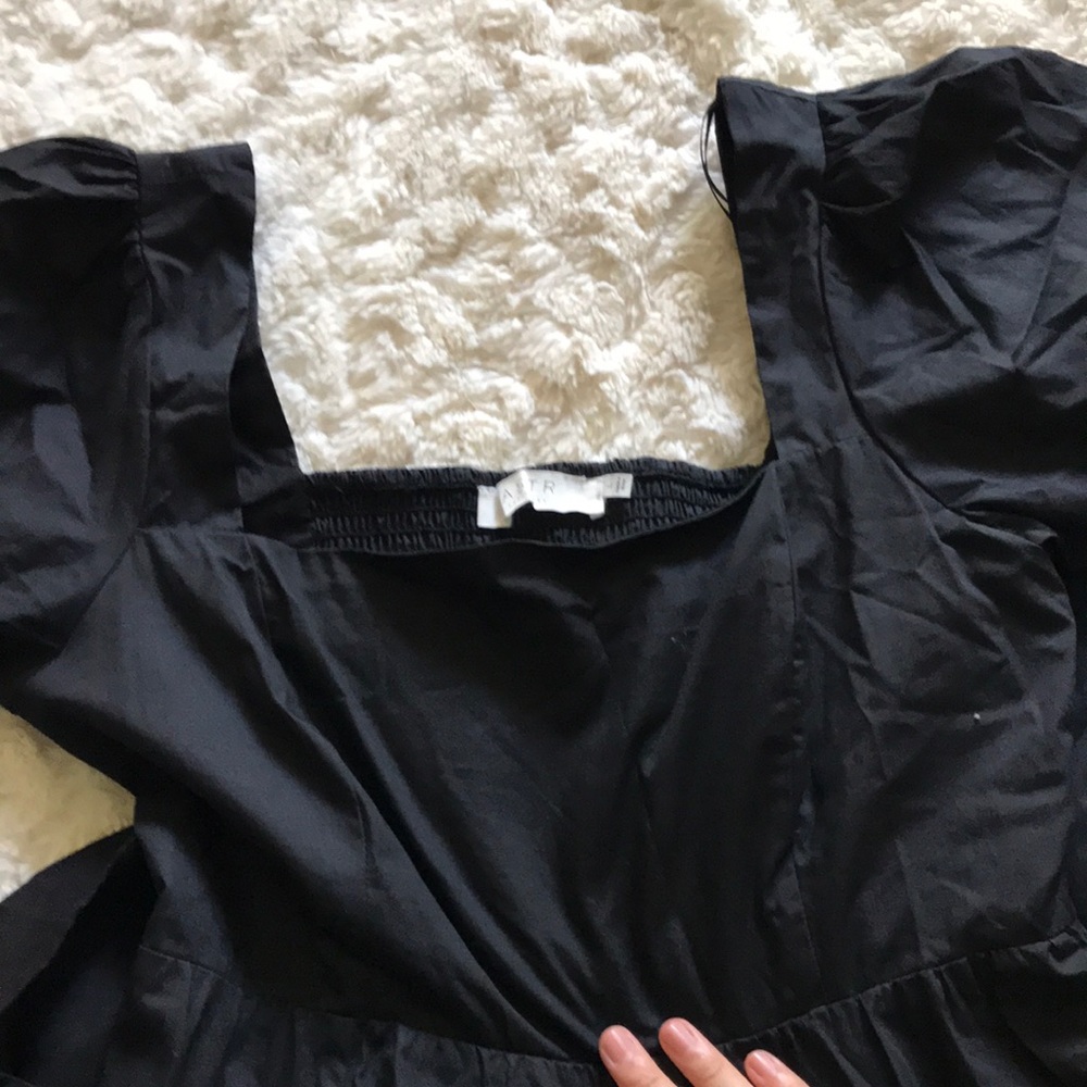 Black asked her the label puff sleeve midi dress with a slit